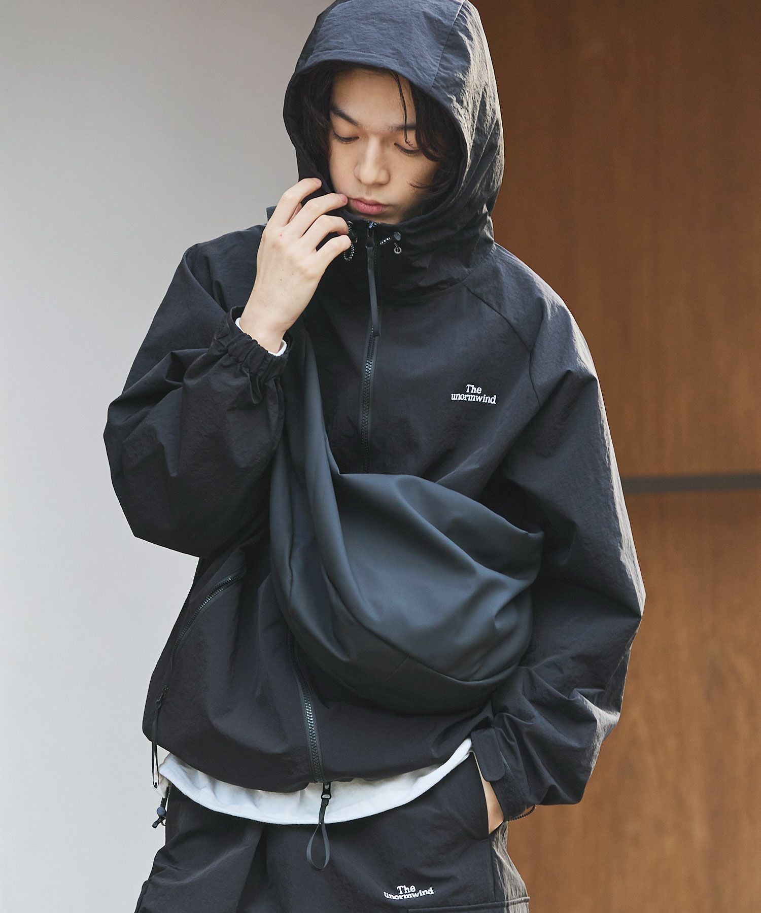 ロゴ刺繍テックナイロンダブルジップドローコードマウンテンパーカー